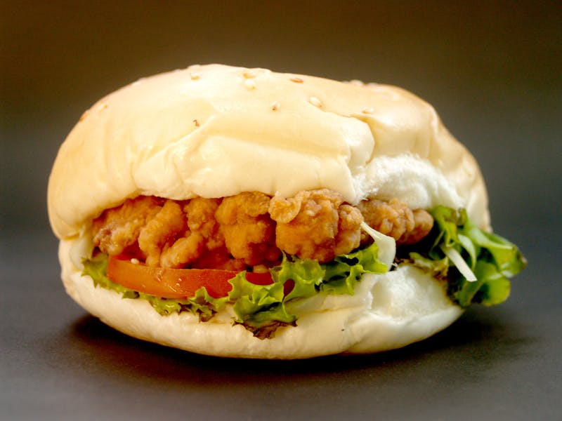 Crispy golden chicken tenders on a plate